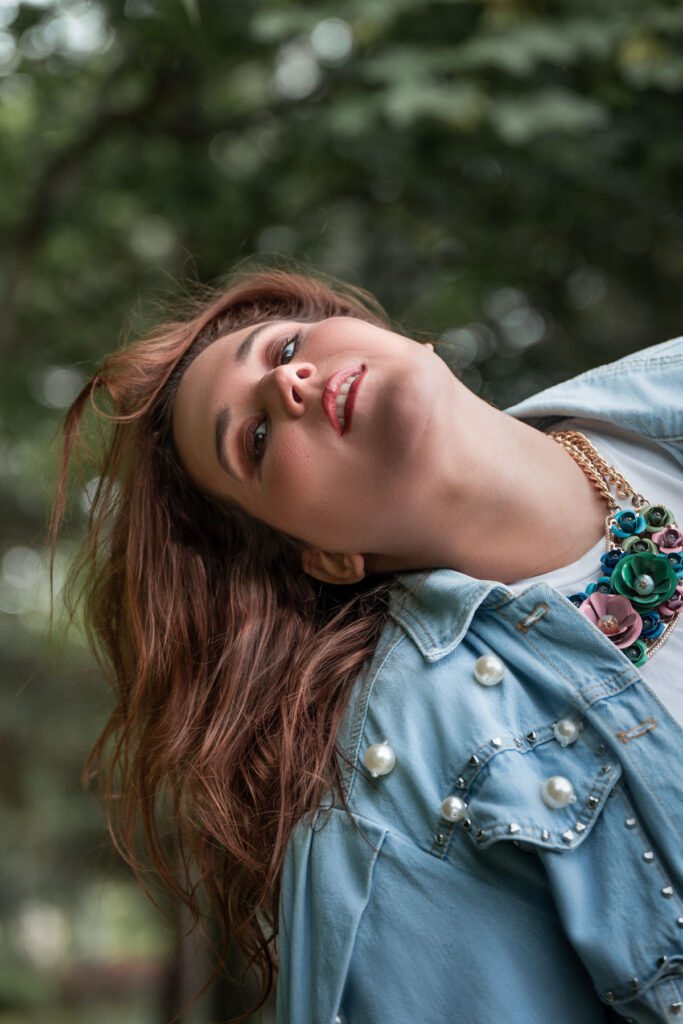 Empowerment portrait of Bernadett Tomasko in motion, captured in nature during the Alma de Primavera photoshoot by Lara’s Media Production in Budapest. Showcasing soft feminine energy with dynamic expression.